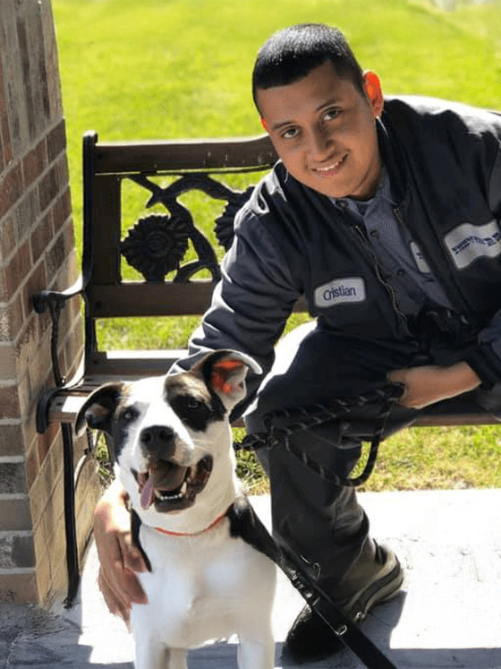 man adopting a white dog